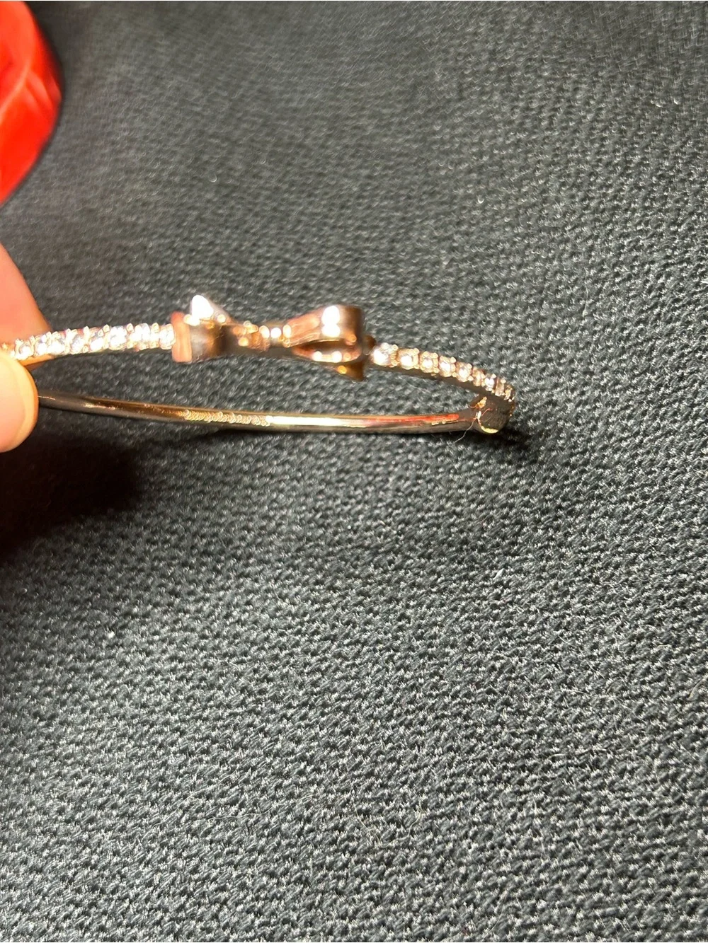 Kate Spade New York Gold-Tone Bow Bangle Bracelet with Crystal Accents - Picture 9 of 9